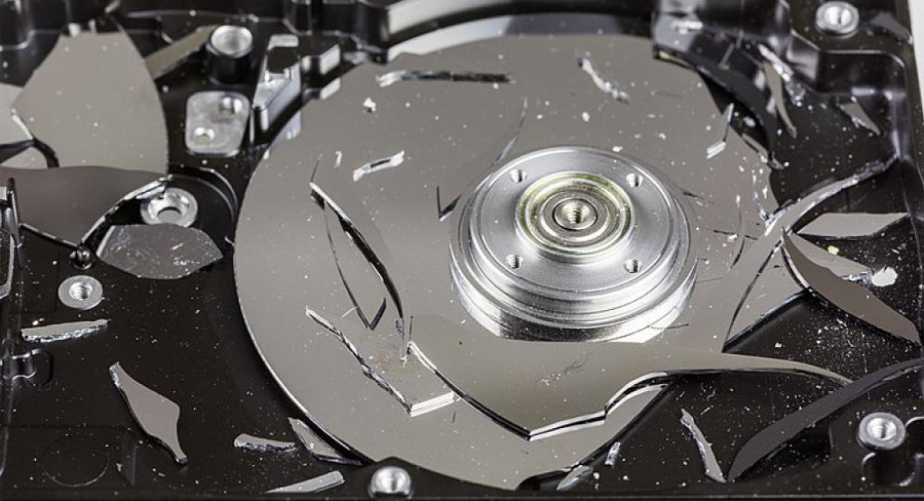A photo of a hard disk with shattered cylinders